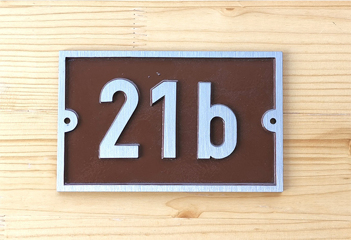 Relief-cast sign