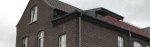 Umbau einer alten Dorfschule zum Mehrfamilienhaus