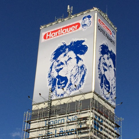 Hartlauer advertising tower