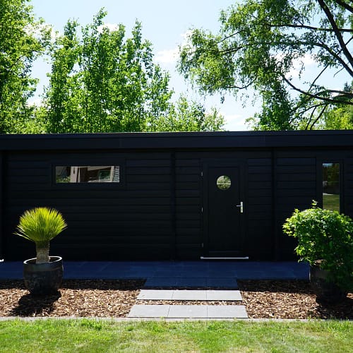 Garden sauna with storage room