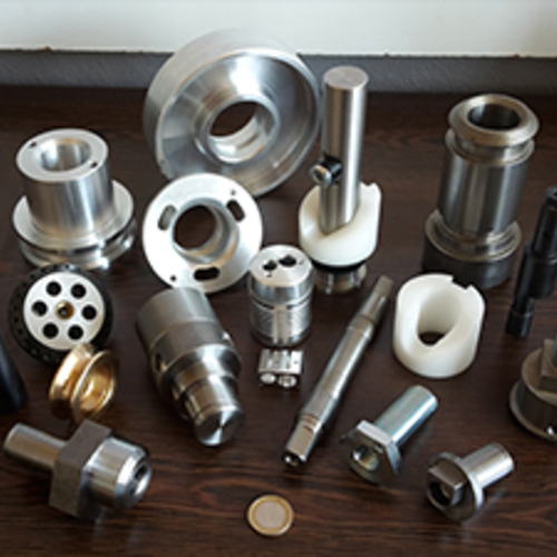 Turned part with cross-drilling