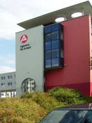 Facade of the Federal Employment Agency with installation logo
