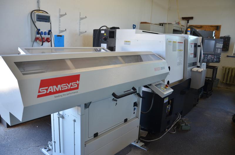 Okuma Genos L200E mit Kurzstangenlader
