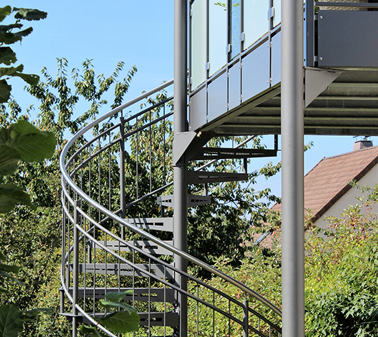 Spiral staircase with balcony connection