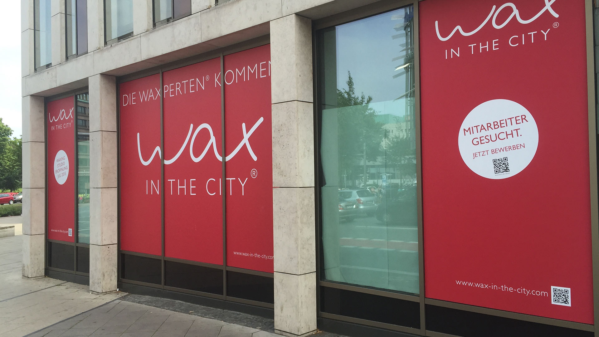 Fassadenbeklebung Wax in the City
